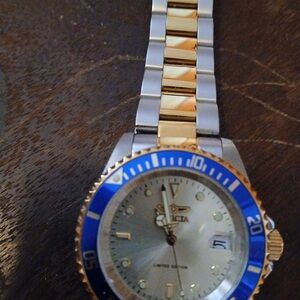 Invicta Gold and Silver Watch with Blue Bezel